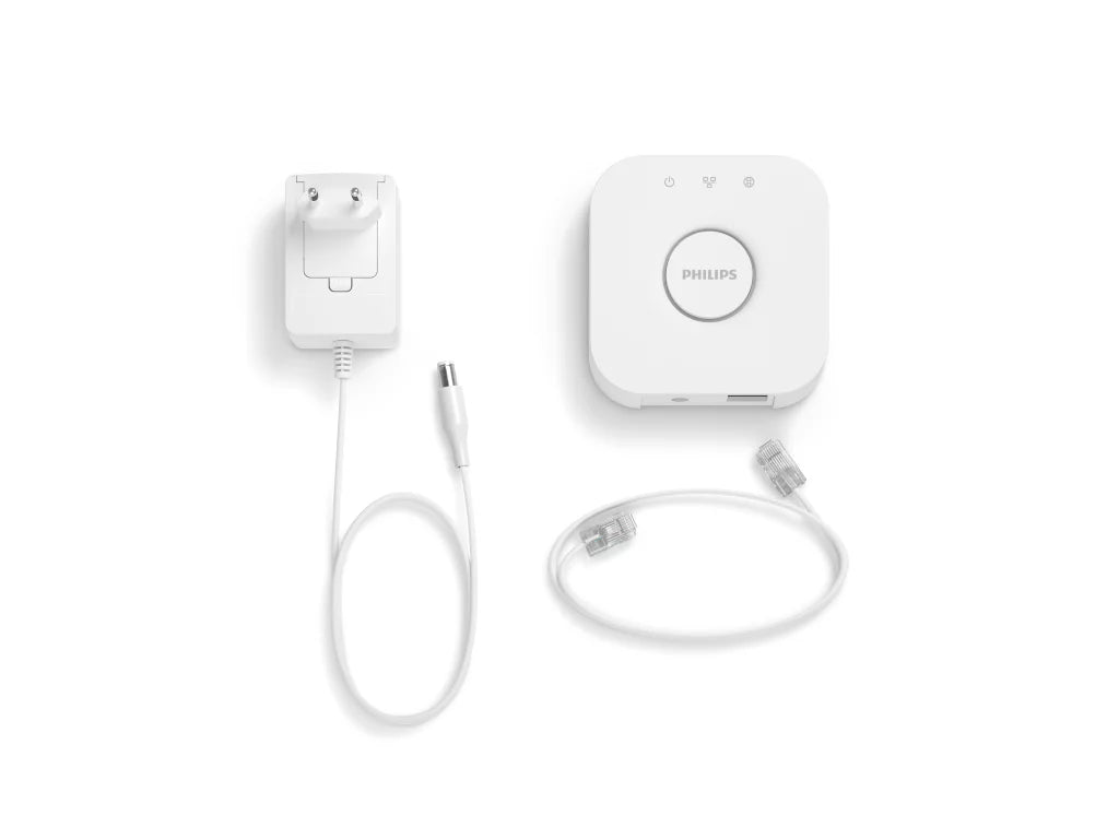 Philips Hue Bridge, valkoinen keskusyksikkö, mukana virtalähde ja liitäntäkaapeli